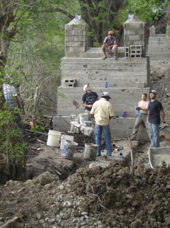 Image of students building cement wall - ewb4